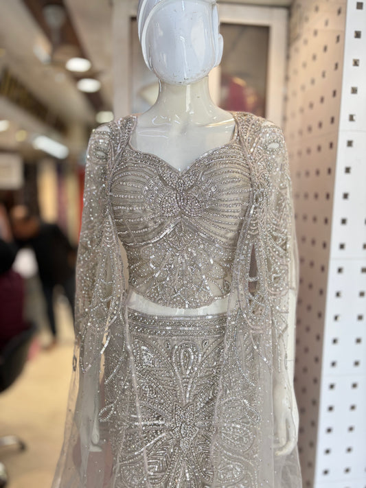 Fishcut lehanga choli with designer cape