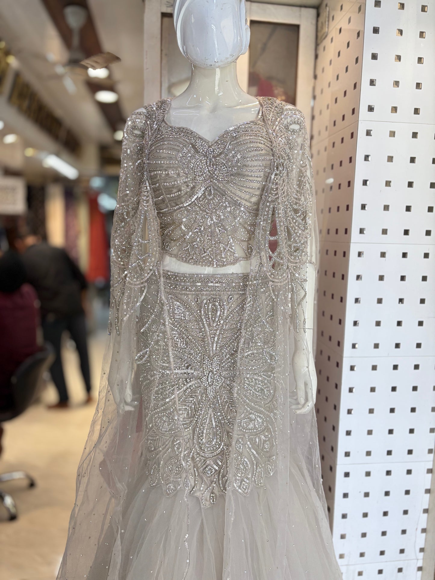 Fishcut lehanga choli with designer cape