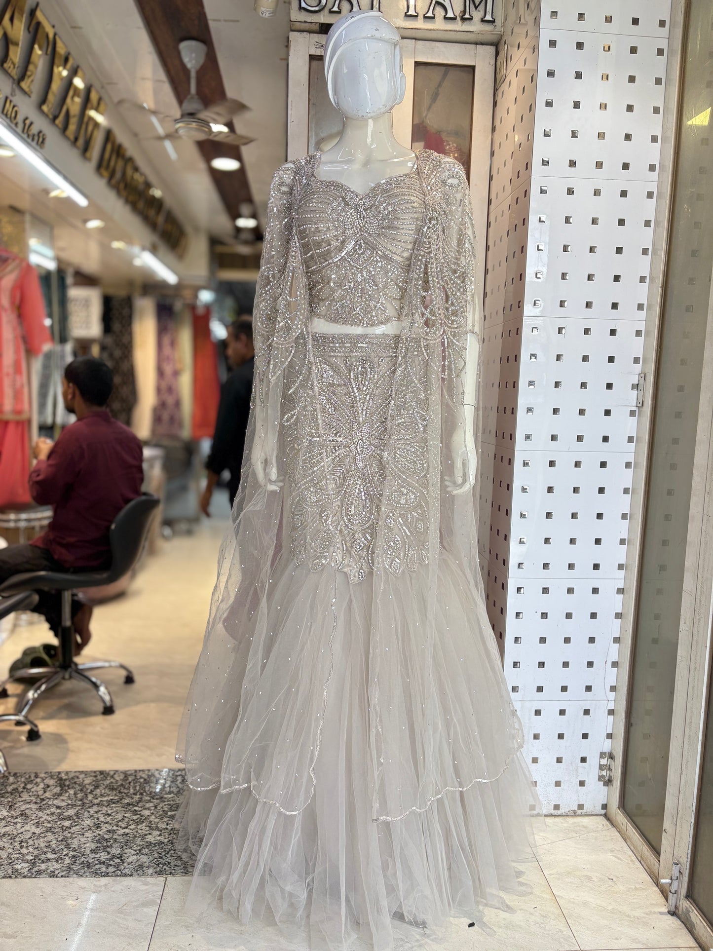 Fishcut lehanga choli with designer cape