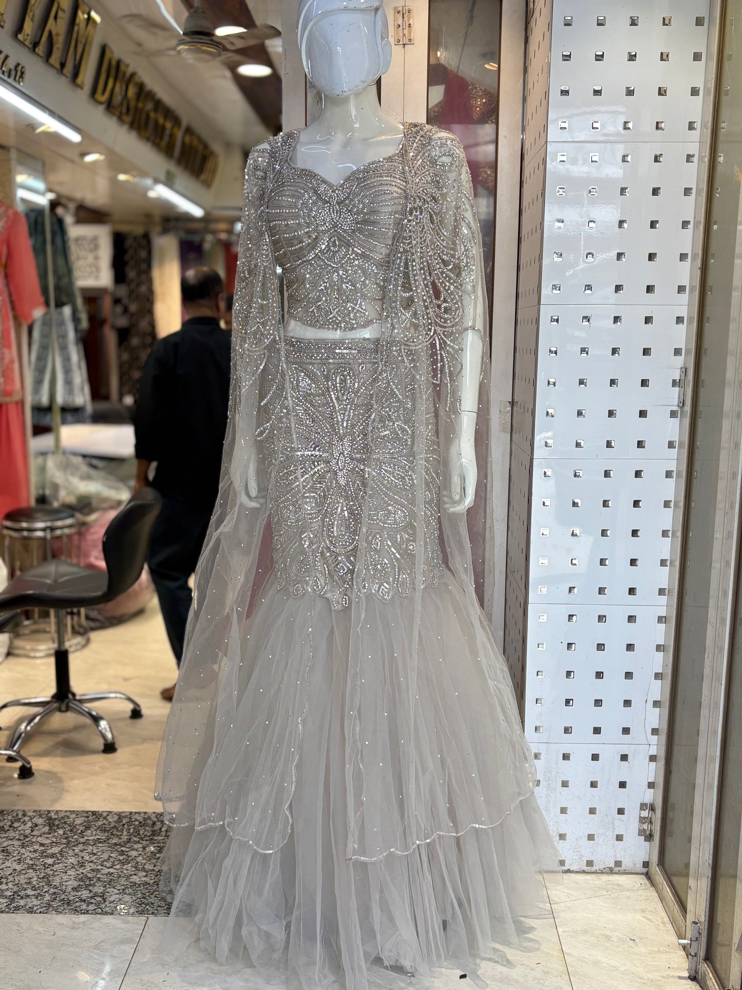 Fishcut lehanga choli with designer cape